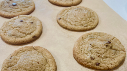 brown butter chocolate chip cookies on parchment paper