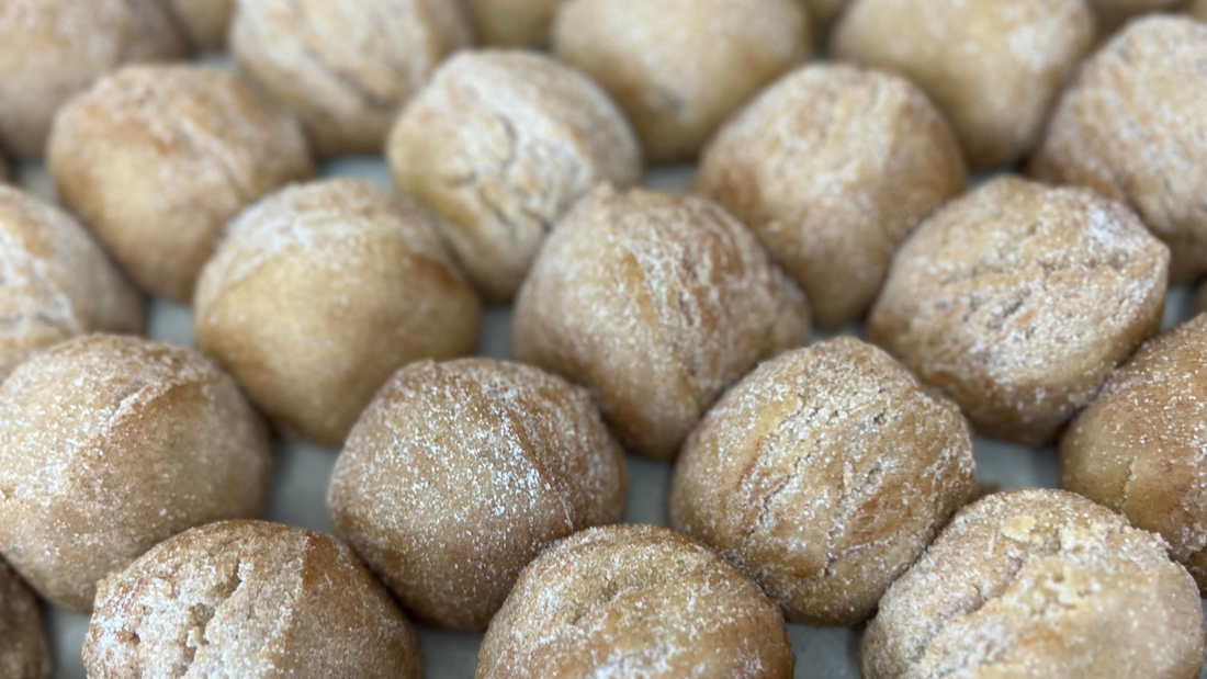 snickerdoodle cookie dough balls rolled in cinnamon  and sugar